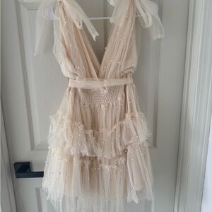 Elegant Cream Tulle Dress with Pearl Accents